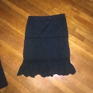 black mid length skirt
